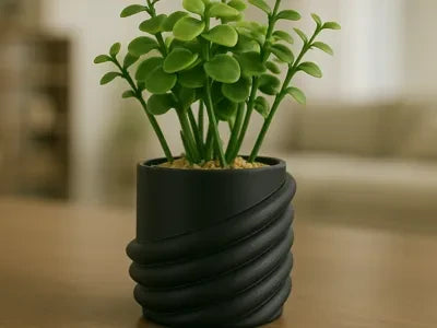 My Store 2 artificial succulent with vibrant green leaves in a modern matte black spiral-ribbed ceramic pot.
